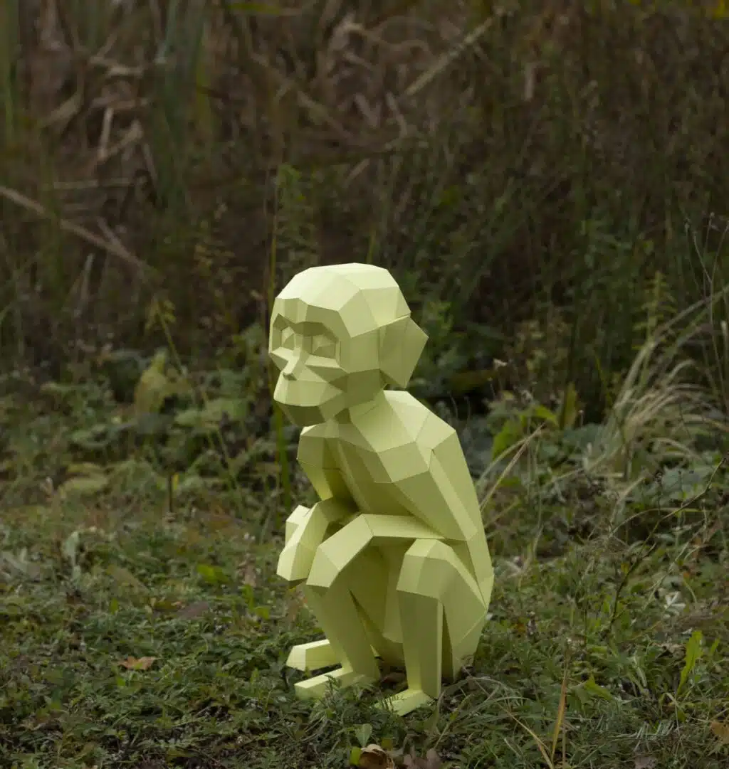 Scimmia seduta in papercraft 3D