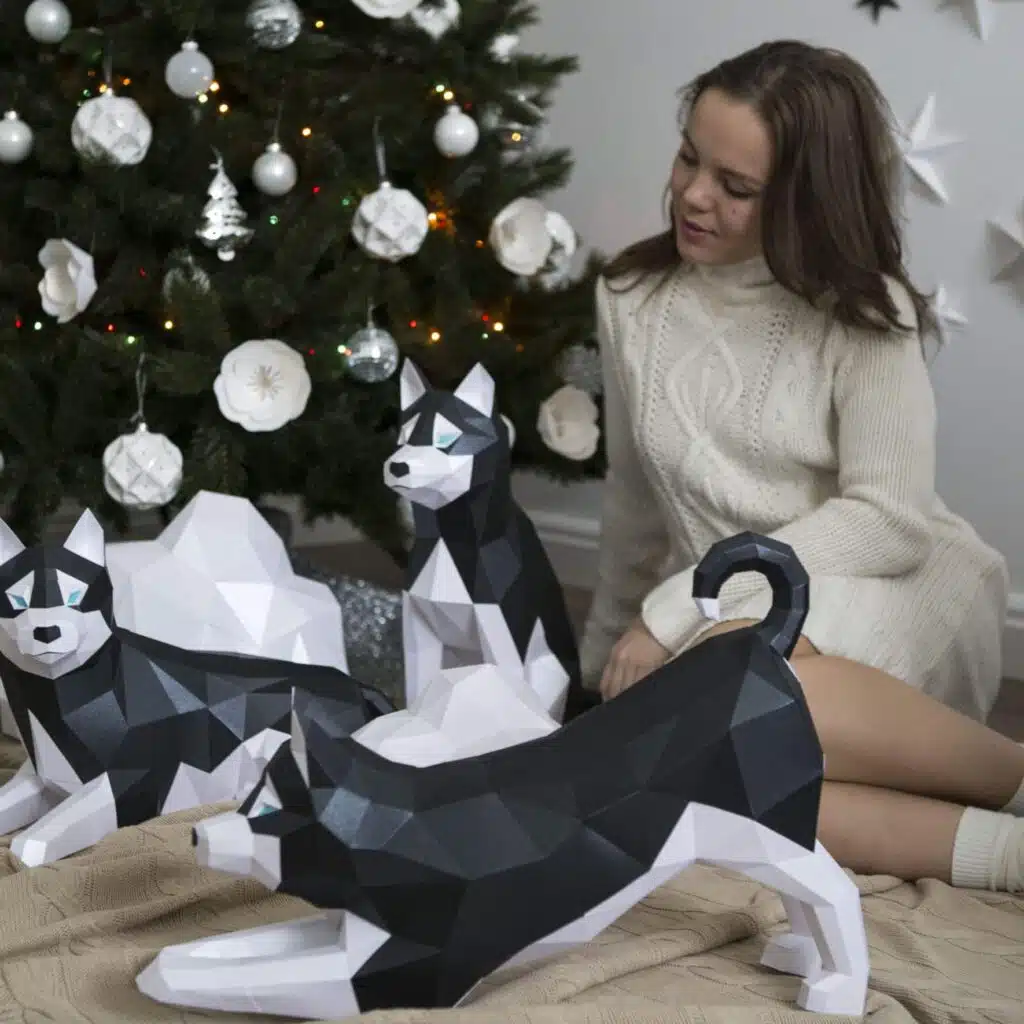 Papercraft of lounging husky in origami 3D