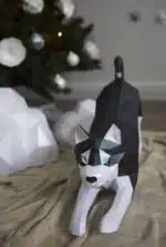 Husky acostado en papercraft 3D