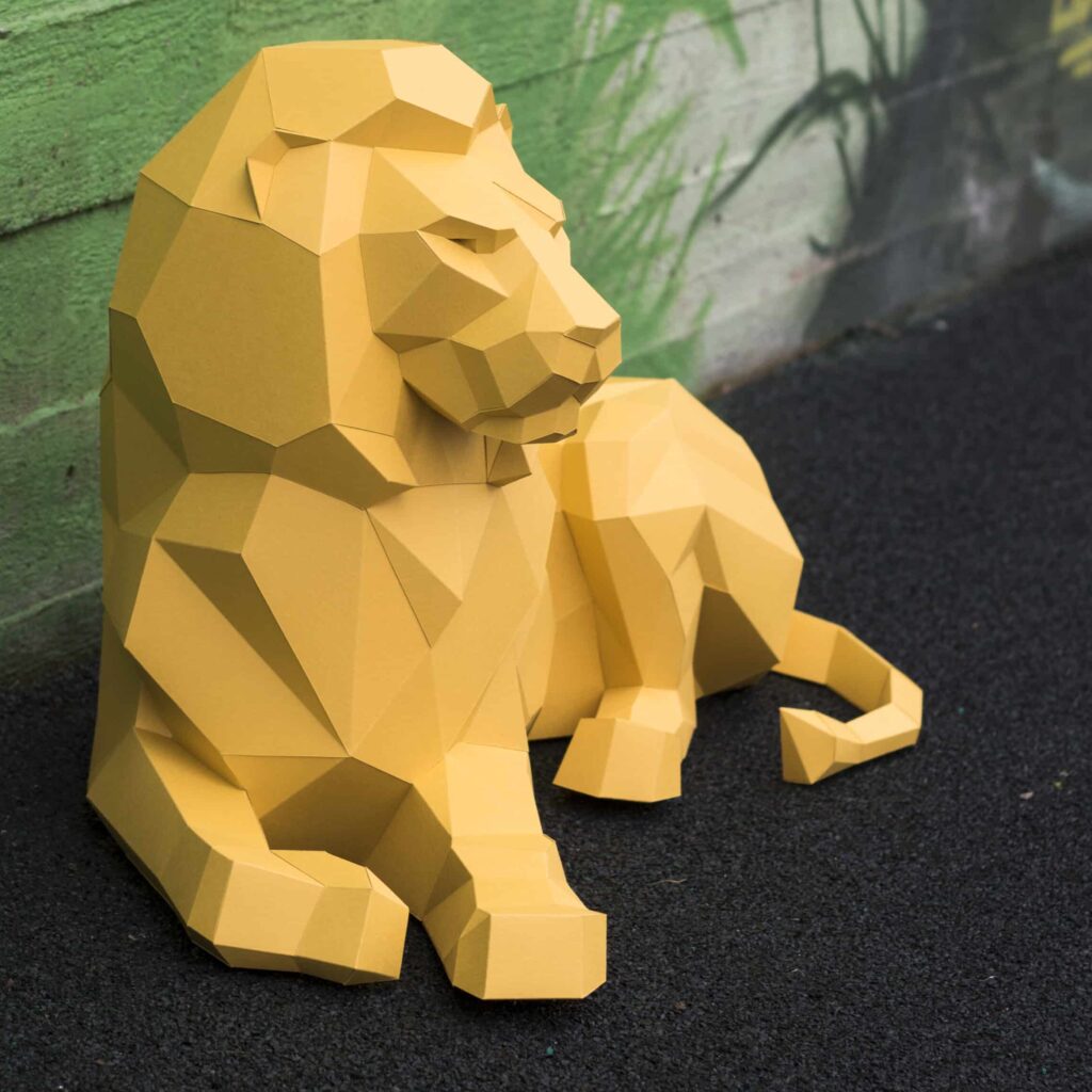 Papercraft of a majestic lion in 3D origami