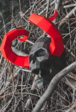Papercraft de crâne démoniaque avec cornes en origami 3D
