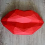 Papercraft of red lips in origami 3D