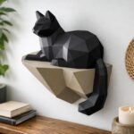 Papercraft gato sobre uma rocha em origami 3D