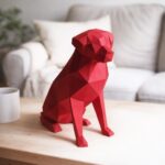 Papercraft eines sitzenden Labradors in Origami