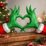 Papercraft de mains en cœur de grinch pour Noël