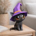Papercraft di piccolo gatto nero stregone in origami