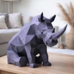 Papercraft de rhinocéros assis en origami 3D