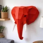 Papercraft de cabeça de elefante vermelha em origami 3D