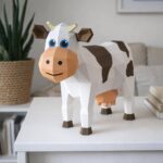Papercraft di mucca cartoon in origami 3D
