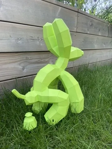 Chien ballon vert fluo humoristique avec crotte en papier