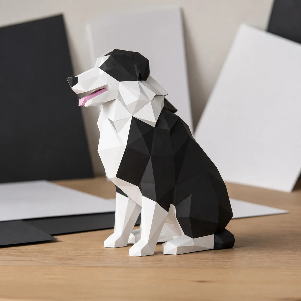 Berger australien noir et blanc en papier low-poly